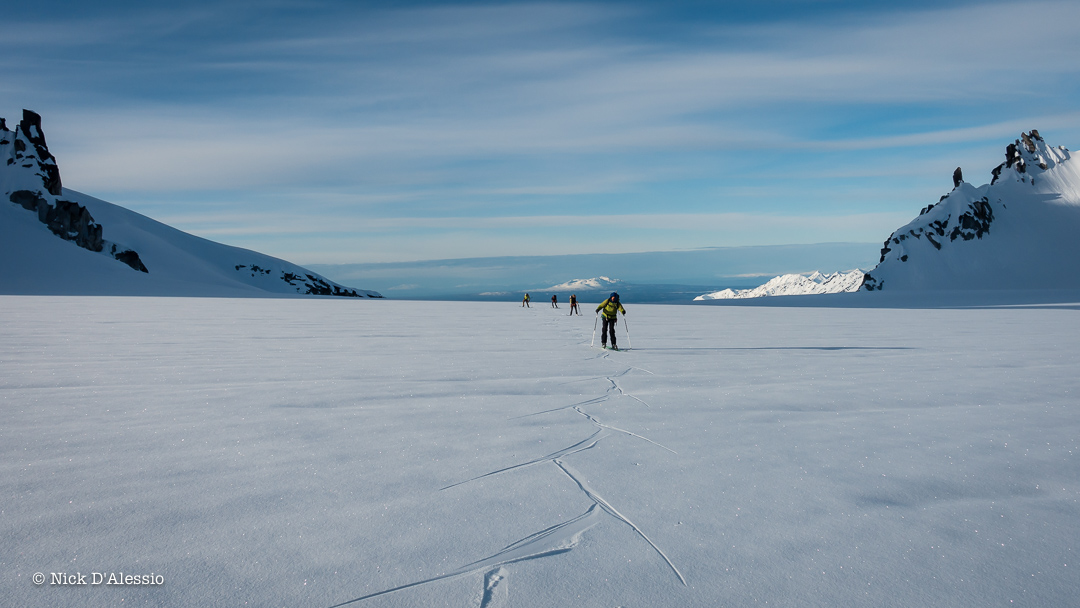 Skate skiing on the frozen glacier to our next objective while guiding in Alaska.