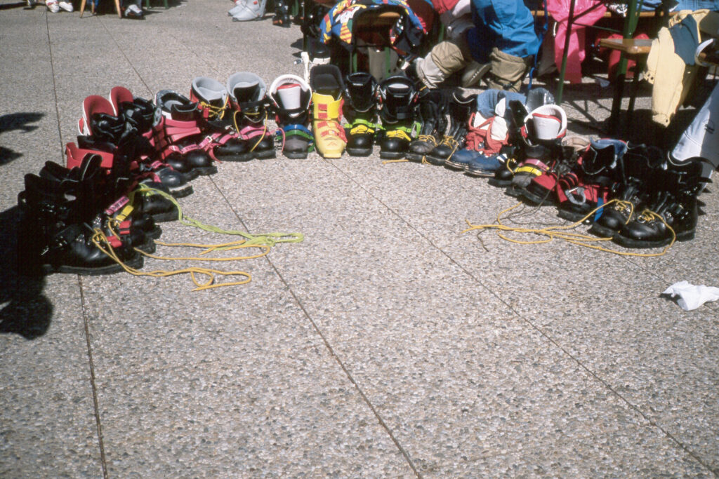 Merrell Supercomp tele boots laid out. Voile Strap Origin Story.