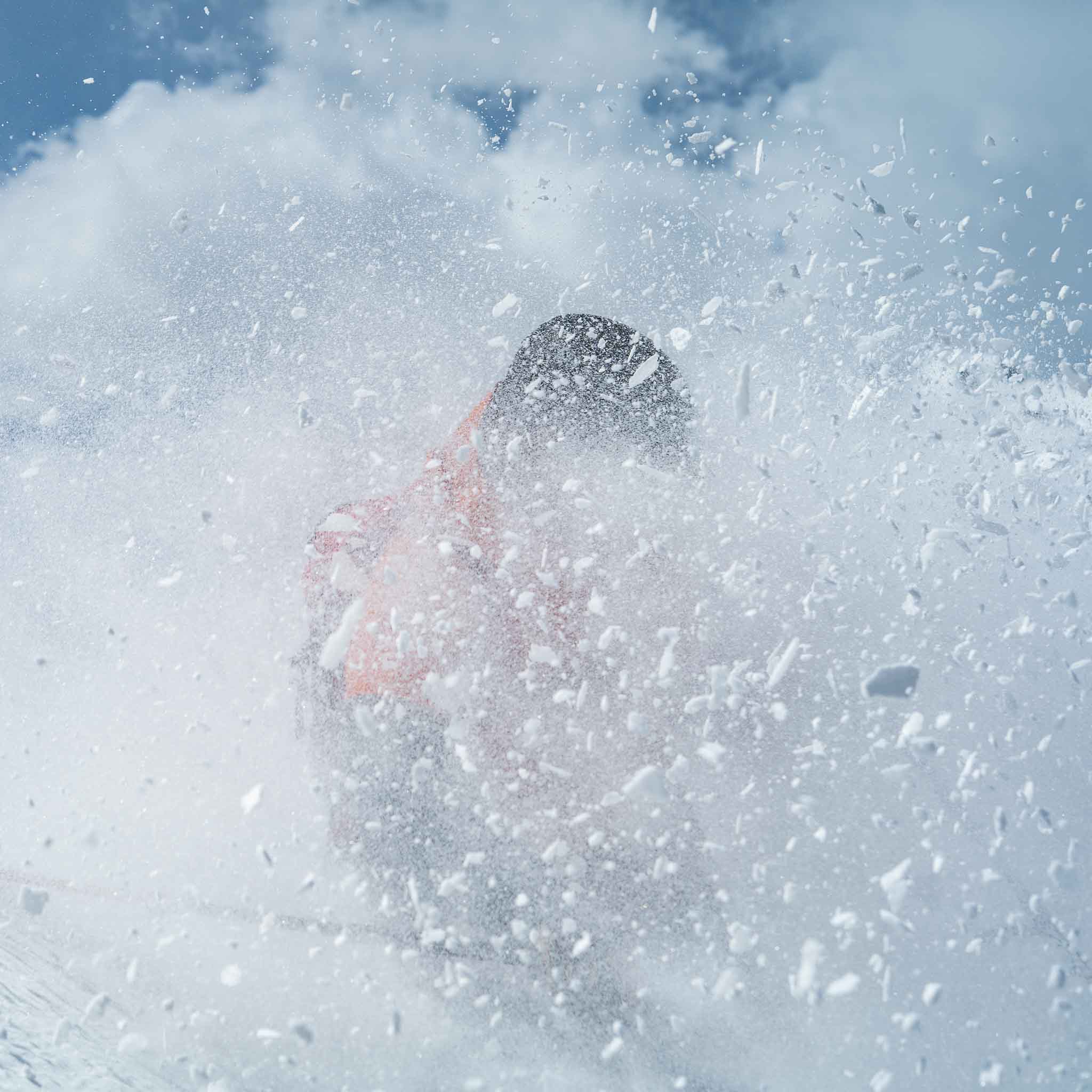 Skier descending powder on Voile Charger ACE skis