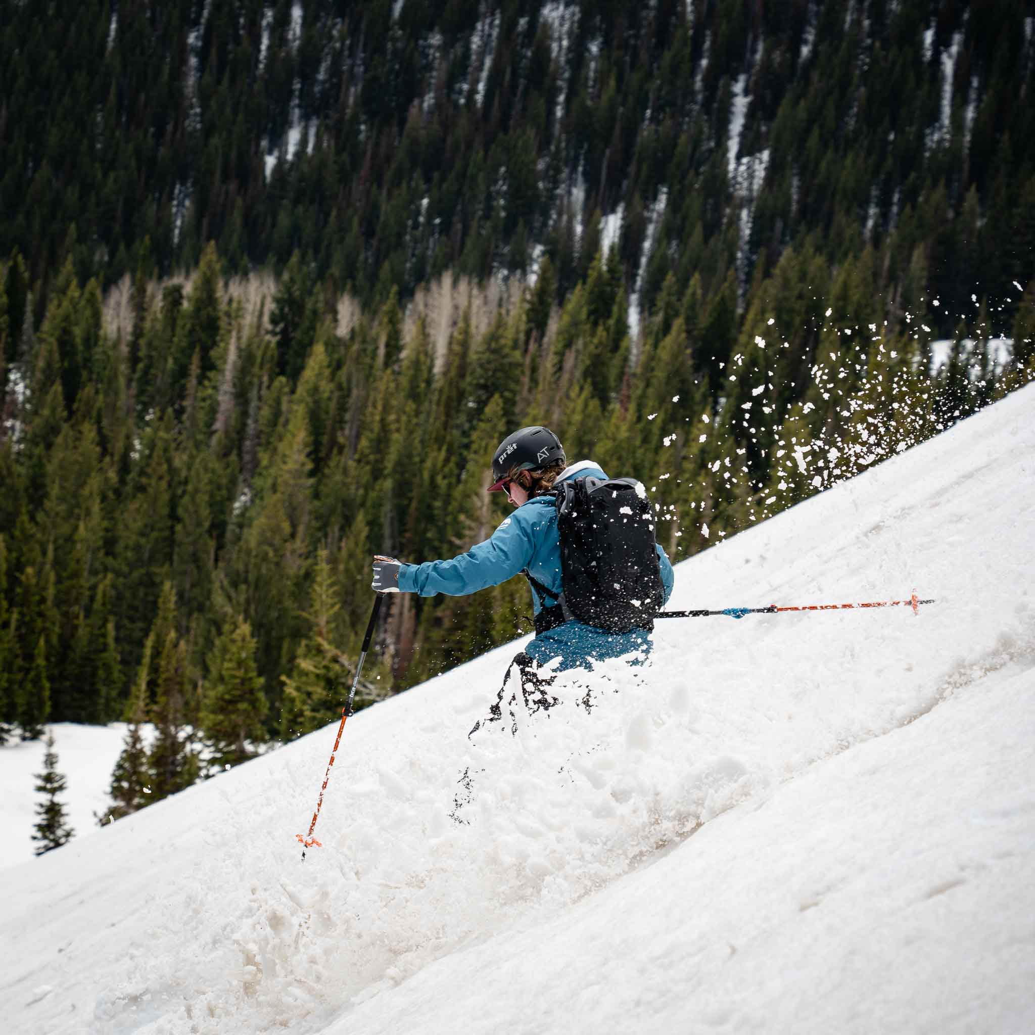 Close up action shot of skier on Voile Vector ACE skis in powder