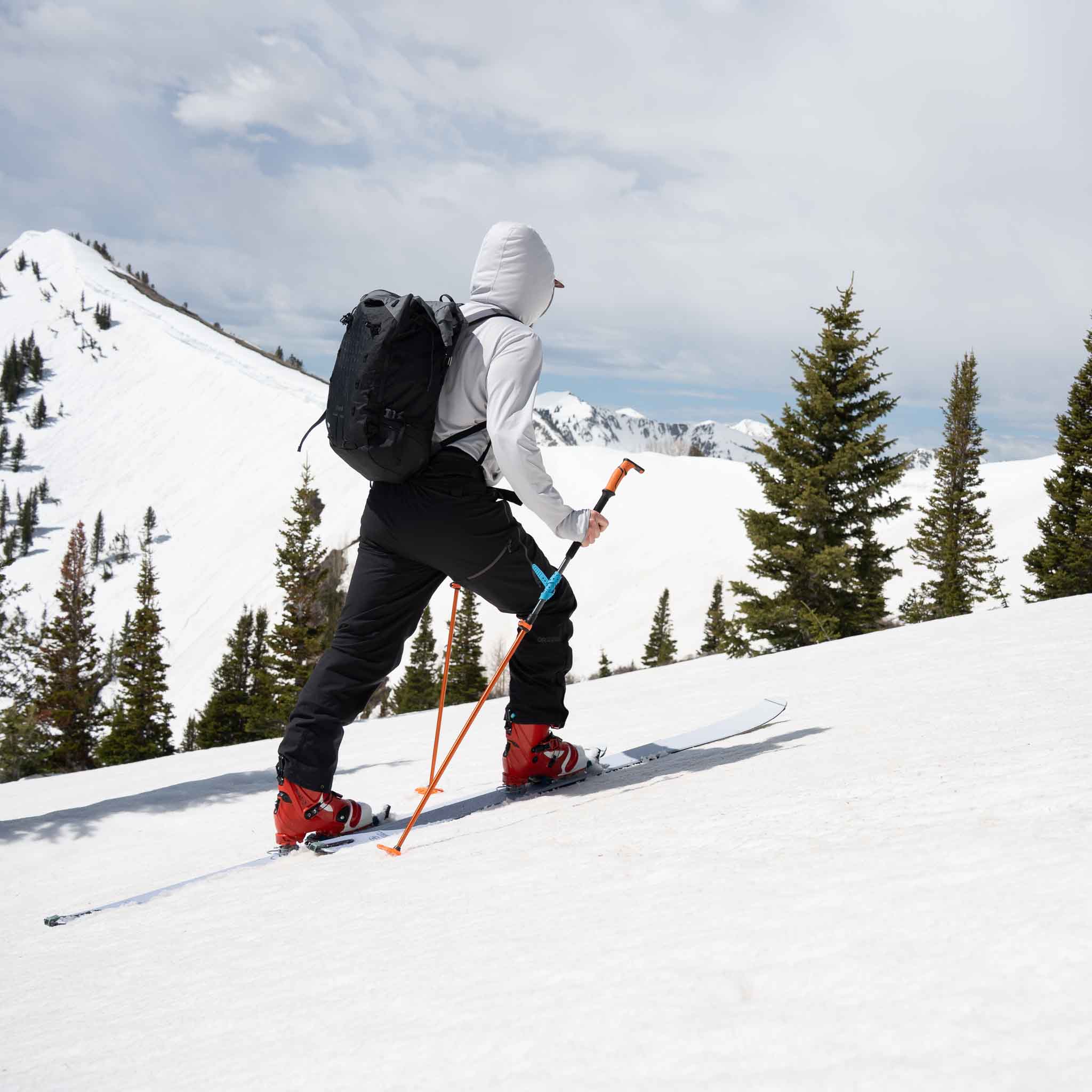 Skier touring uphill with Voile Vector ACE skis